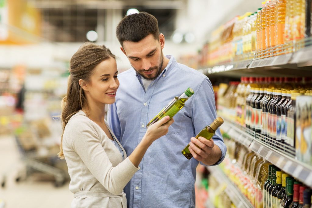 olive oil consumer test Woman buying wine